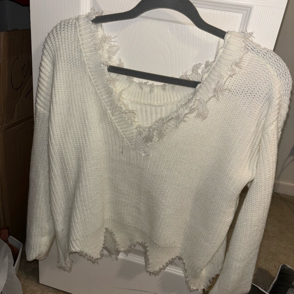 V-neck fringed distressed white sweater